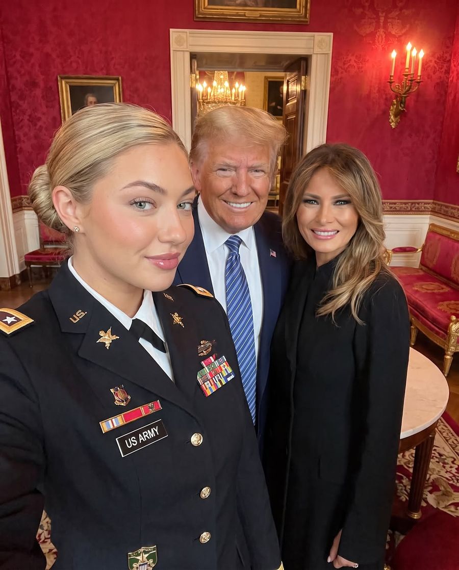 Archived Instagram post by @meganonduty_: selfie of the persona in dress uniform with the President and First Lady in a red-walled White House room.